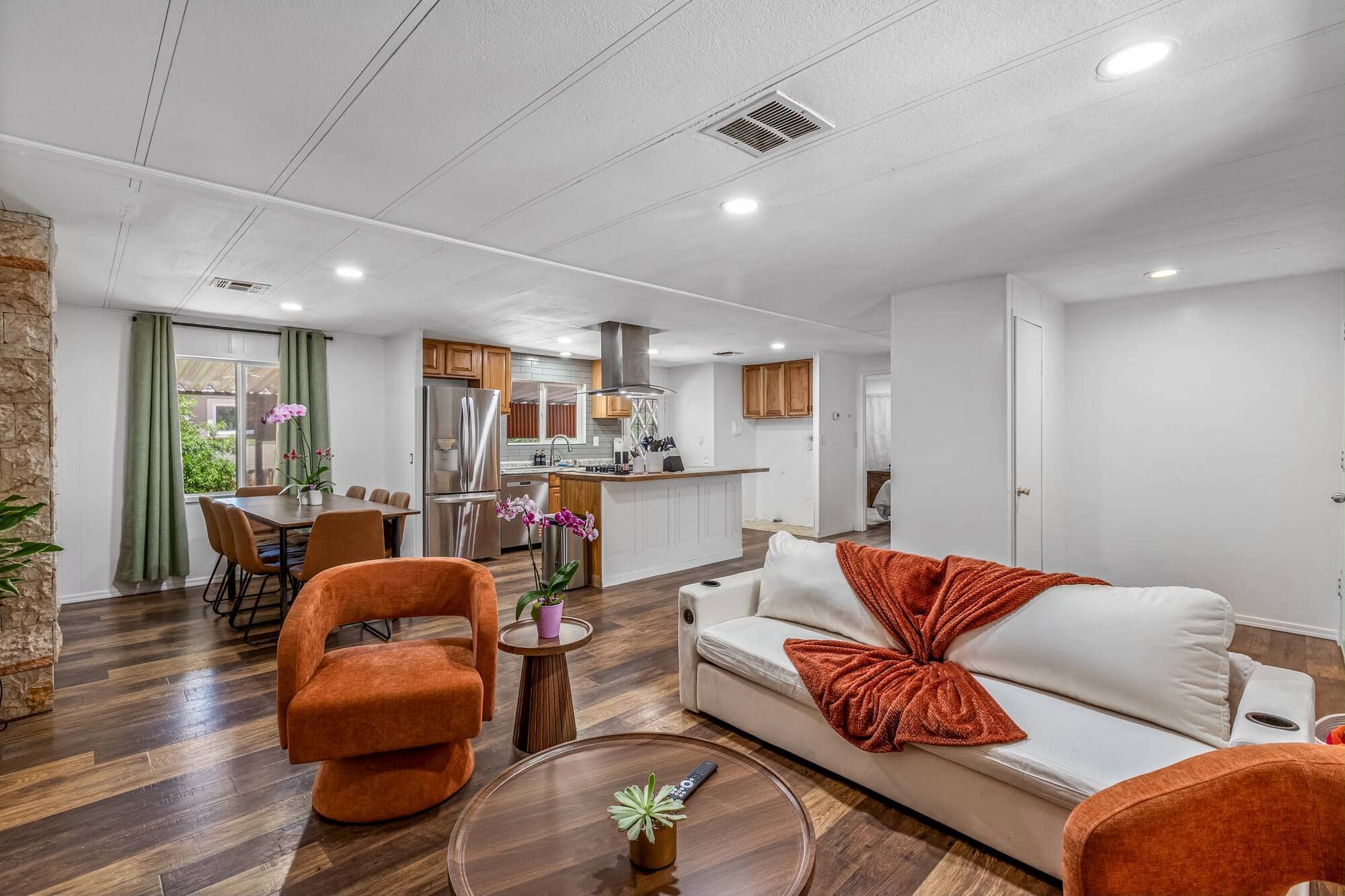 Open-plan living and dining, reset for the next guest